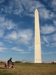 Aaron bikes by the Washington Monument
