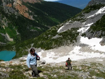 Blue Lake down below, mountain peaks up ahead.