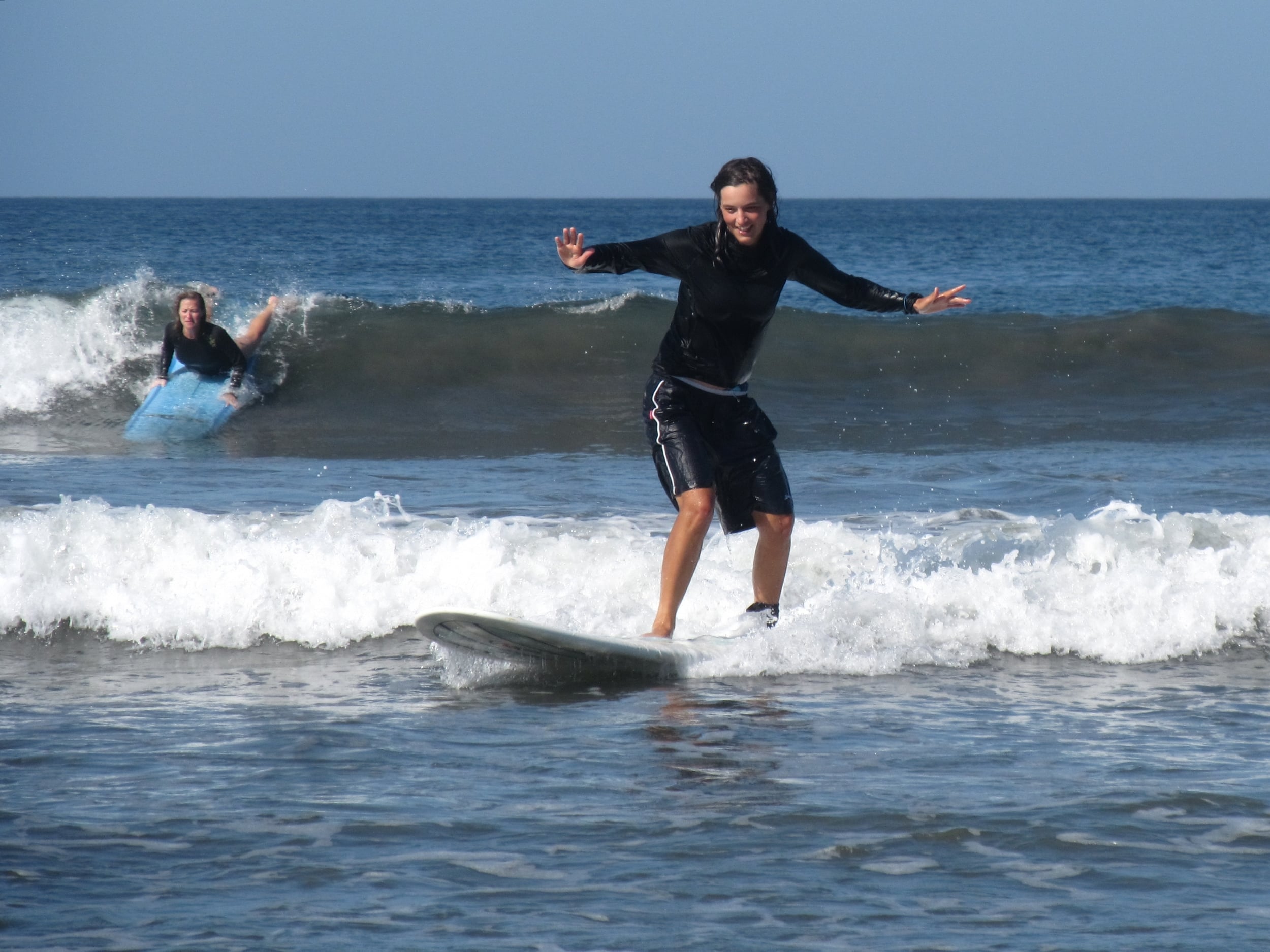 Nia killing it out there on the waves. I was lucky to stand up.