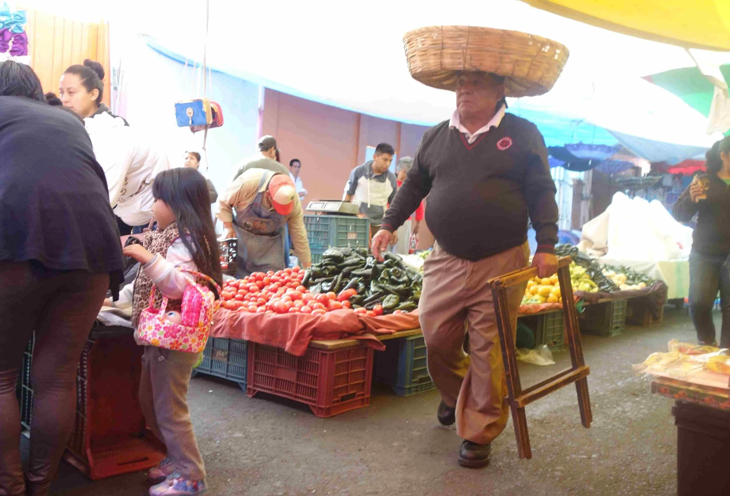 Back to the bustle of markets, Spanish, and organized chaos.