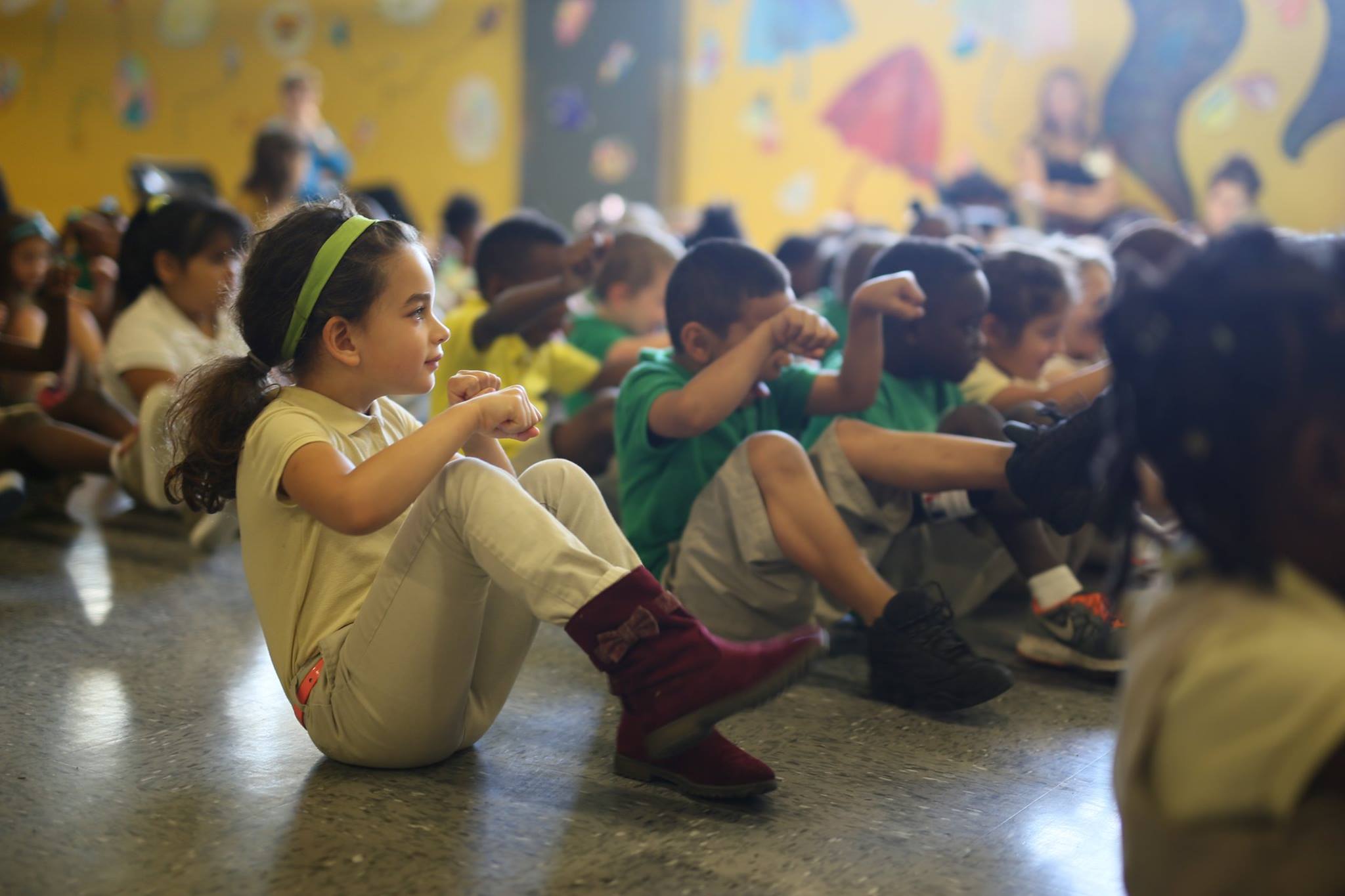 Kindergartners in Kansas City "bike" with me and think about what it would be like to go on this trip and not be able to find food. Photo credit: Citizens of the World Charter School