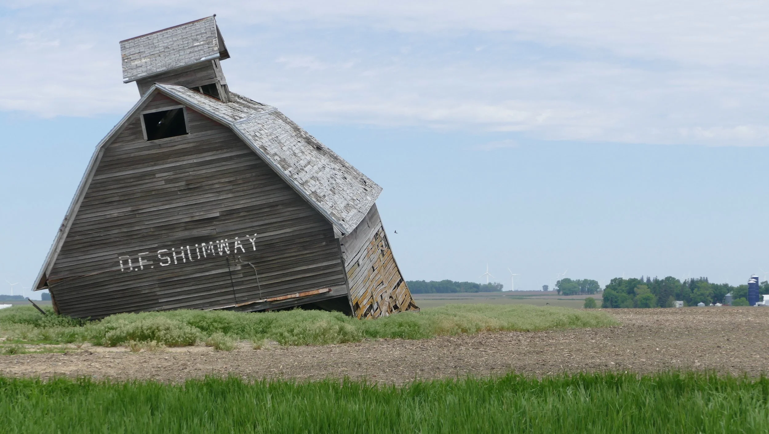 I was starting to feel like this barn as I biked across Iowa, a bit weighted down by reality.