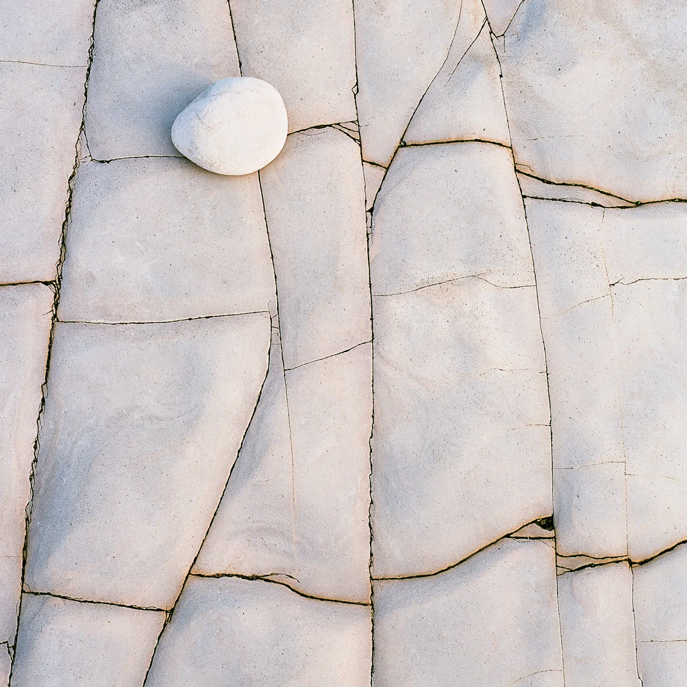 White Stones, Montana De Oro, California. 2018 Here is some info on the photo, just a maybe about two to four sentaces. Describing the area and the image or maybe the conditions of the place when it was taken. This is so I can see what the text looks like in the area. How about one more sentace. Okay thats probably about right. Purchase Information