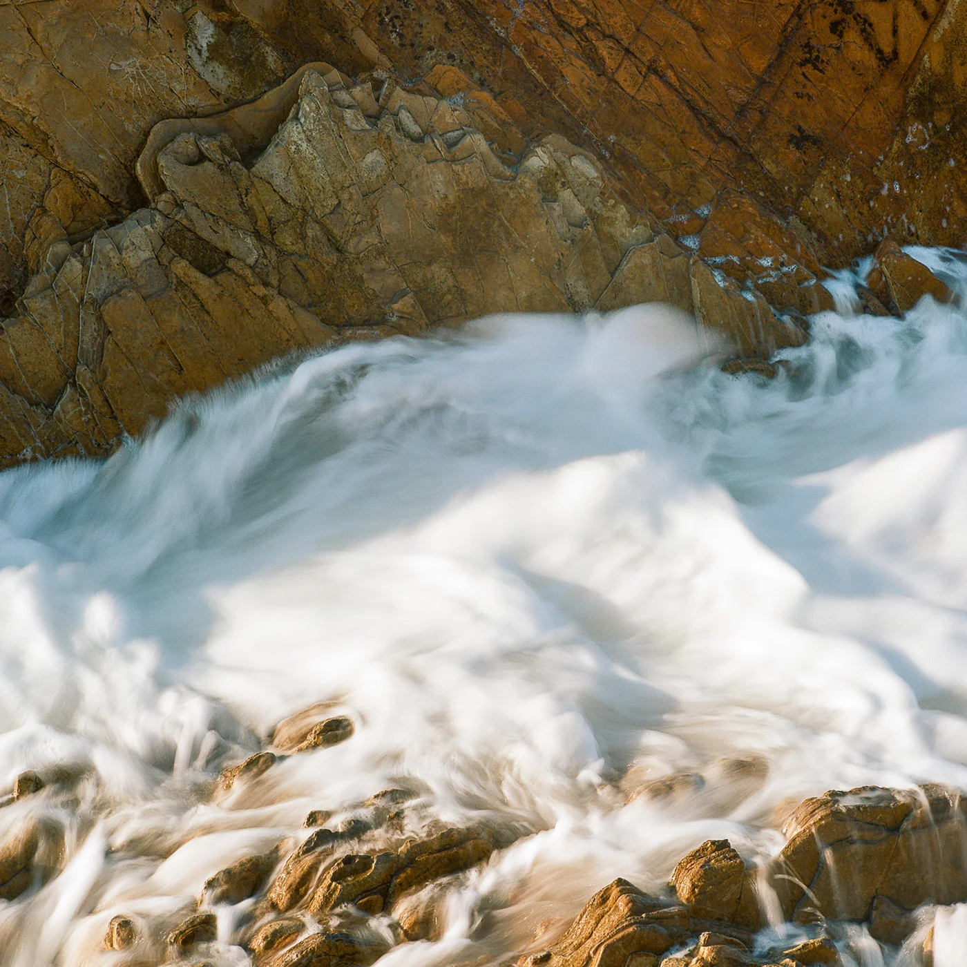 Sea foam on Sandstone, Montana De Oro. California. 2015 Here is some info on the photo, just a maybe about two to four sentaces. Describing the area and the image or maybe the conditions of the place when it was taken. This is so I can see what the text looks like in the area. How about one more sentace. Okay thats probably about right. Purcahse Information