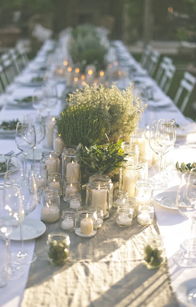 3. RUSTIC LUXURY; AN AL FRESCO TUSCAN WEDDING : The beauty of Italian dining is that it's simple; all you need is a crisp white tablecloth , natural linen runner , an abundance of candles , votive holders and fresh greenery to create your very own Italian feast.