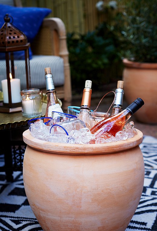 6. THE COOLEST PLANTER FEATURED ON ONE KINGS LANE : This is one of those, why didn't I think of that moments. DUH. Talk about a genius way to DIY yourself an oversized ice bucket that you don't even have to drain, thanks to the hole in the bottom. Just be careful where you put this thing. Like, not on an outdoor carpet. 