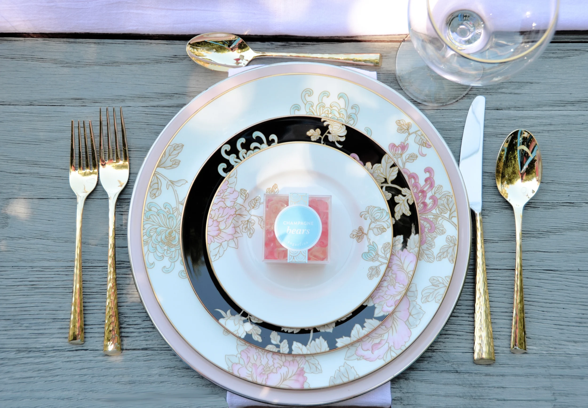   Favors:  Sugarfina  Mini Champagne Bear Boxes 