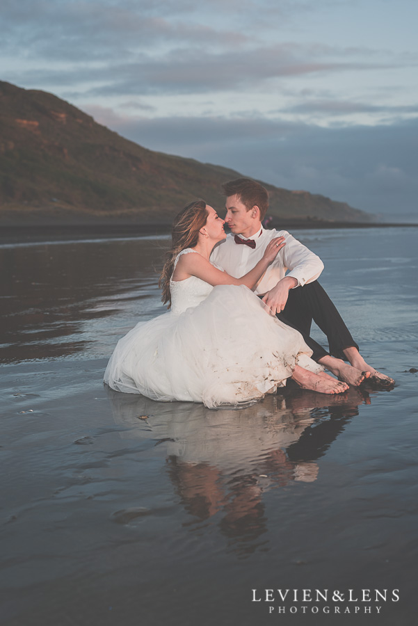 Stunning couple meeting sunset on the beach