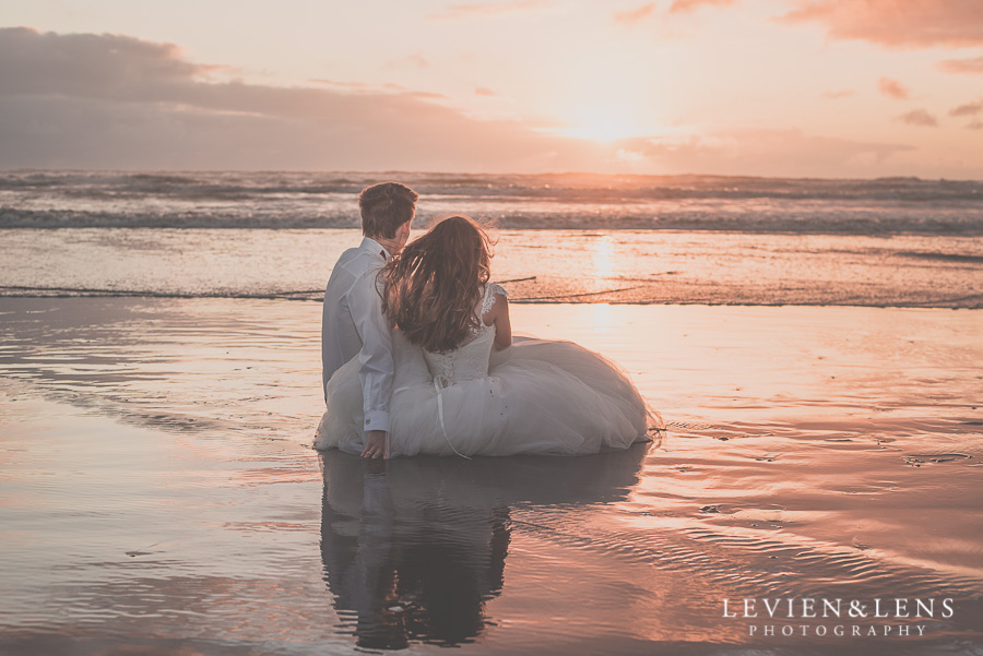 Sophisticated couple meeting sunset on the beach 