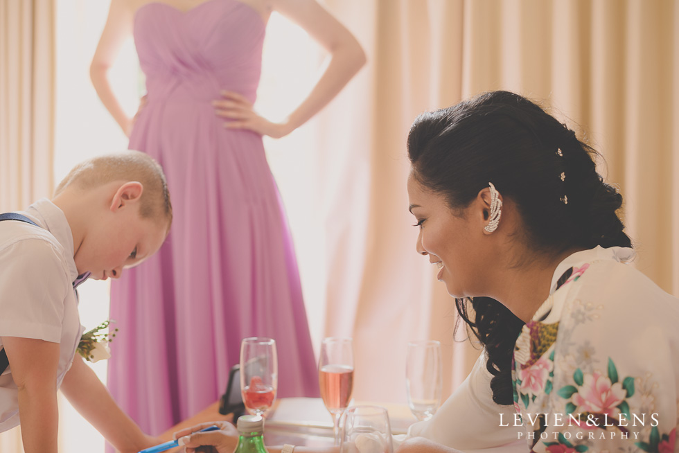 bride playing with boy {Waikato-Bay of plenty wedding photographer}