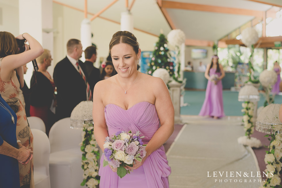 bridesmaids walking down aisle {Auckland wedding photographer}