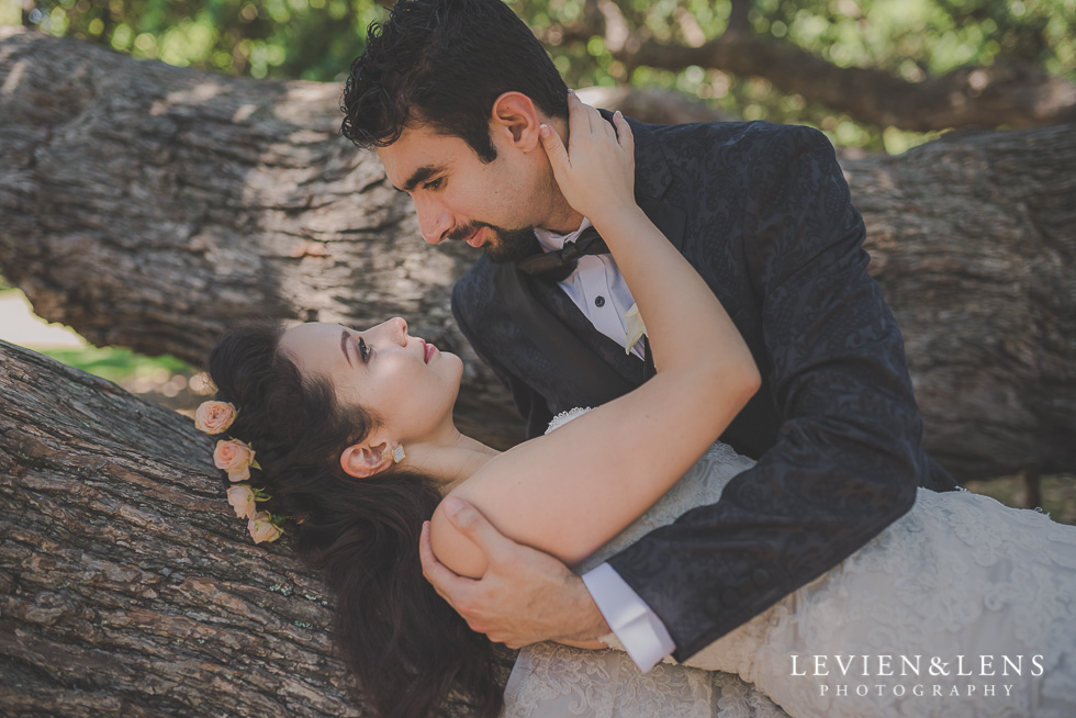 bride laying on tree Parnell on the Rose Garden {Auckland lifestyle wedding photographer}