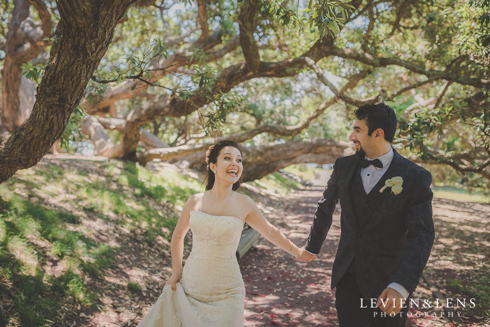 bride groom walking on alley Parnell on the Rose Garden {Auckland lifestyle wedding photographer}