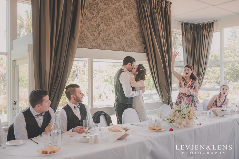 couples kiss Parnell on the Rose Garden {Auckland lifestyle wedding photographer}