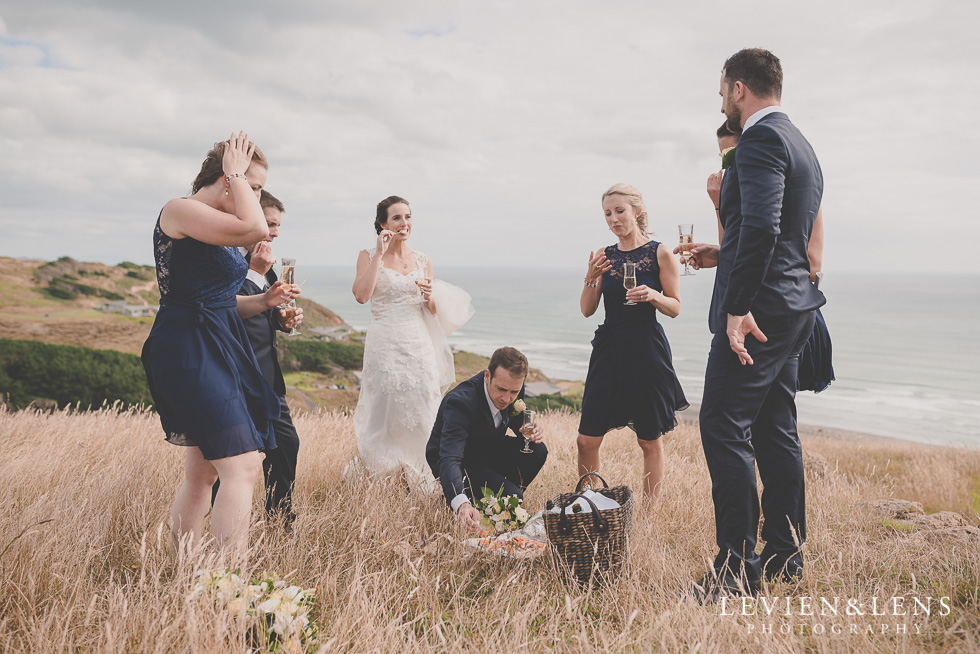 bridal party bride groom location shoot Kariotahi beach Castaways {Auckland wedding-engagement-couples photographer}