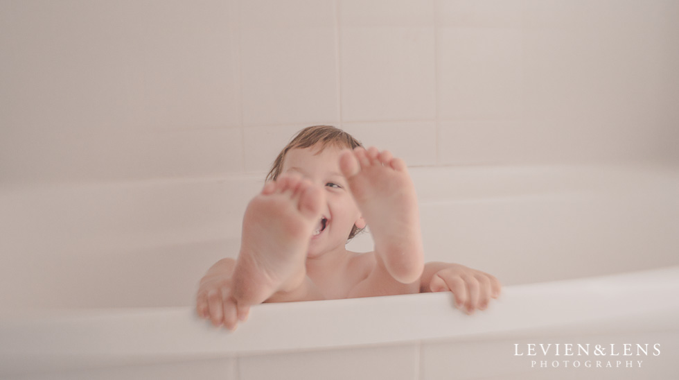 Little one having fun in the bath {Hamilton lifestyle family-kids photographer}