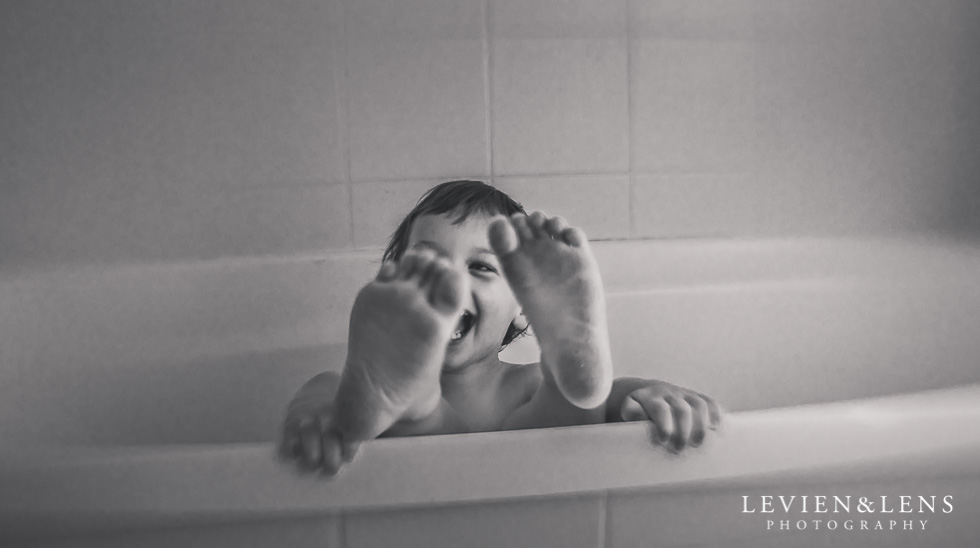 Little one having fun in the bath {Hamilton lifestyle family-kids photographer}