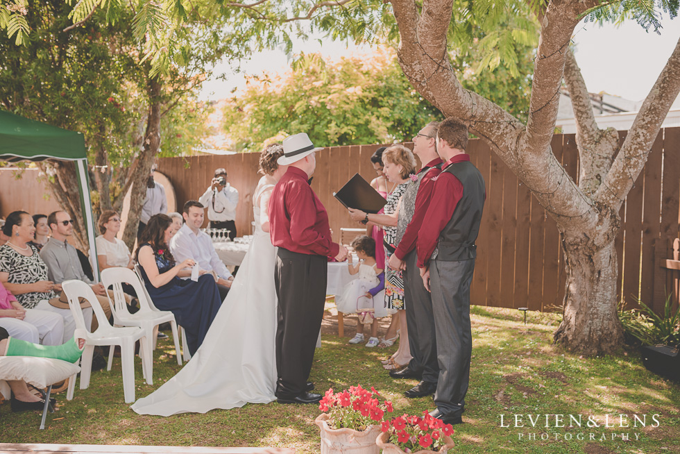 father give daughter a way small family garden wedding ceremony {Auckland lifestyle couples-engagement photographer}