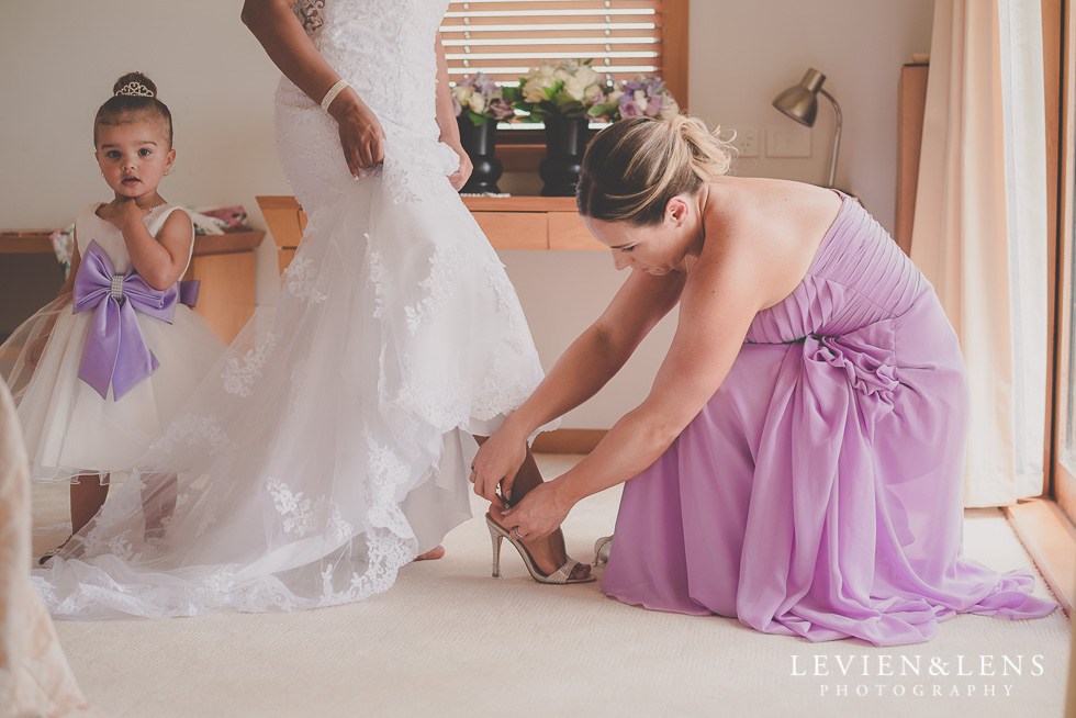 bride putting shoes on {Auckland-Hamilton-Tauranga lifestyle wedding-couples-engagement photographer}