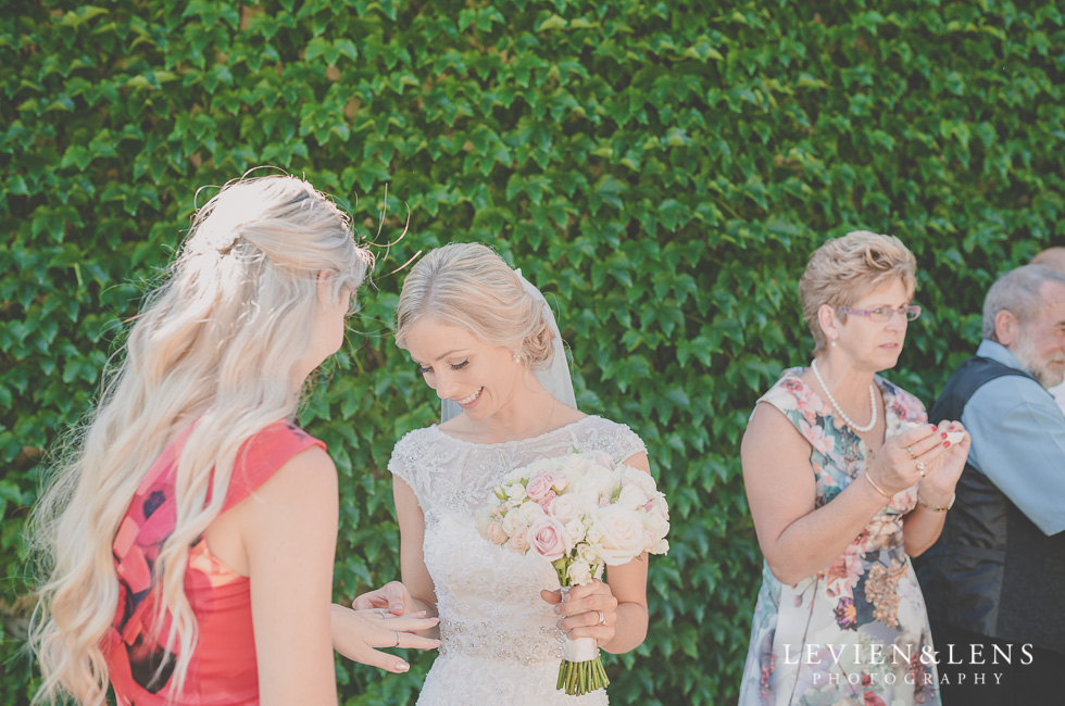 bride look at engagement ring {Tauranga-Bay of Plenty wedding-couples-engagement photographer}