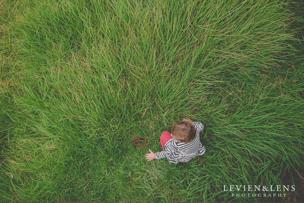 girl in long grass North Head {Auckland lifestyle wedding photographer}