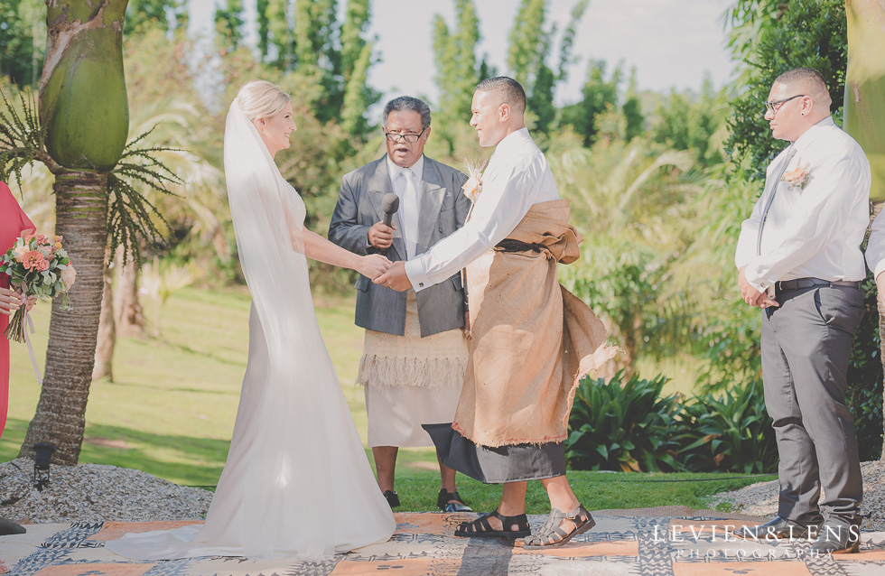 bride and groom happy ceremony Landscendt Tropical Garden {Auckland lifestyle wedding photographer}