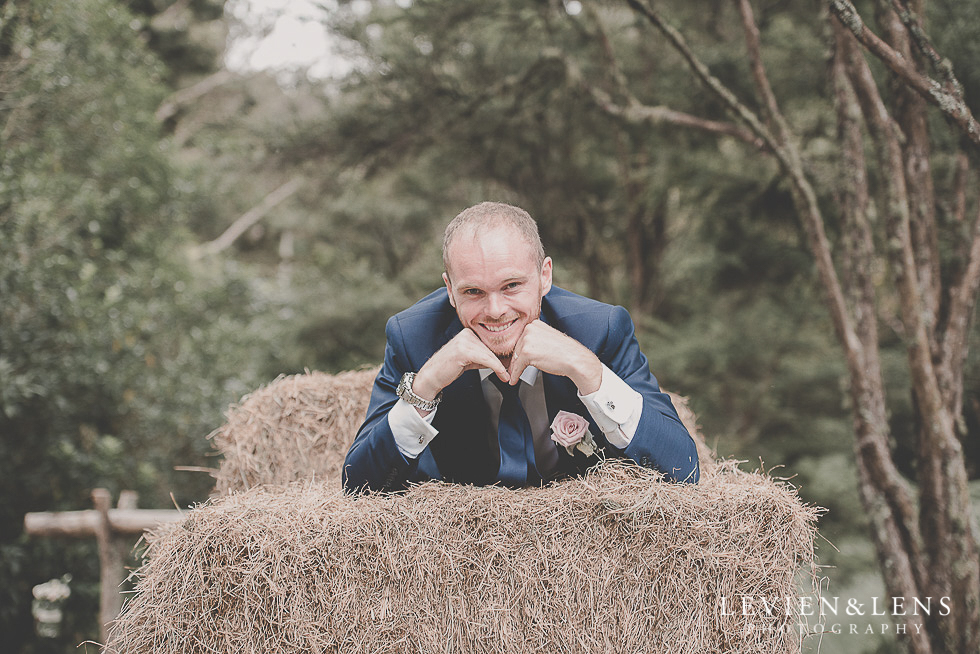 groom on hay guests {Auckland-Hamilton-Tauranga wedding photographer}