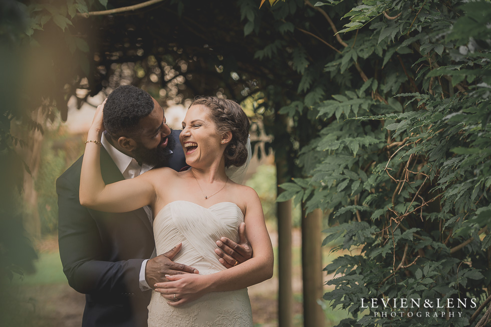 bride and groom laughing Brigham - Herald Island {Auckland lifestyle wedding photographer}
