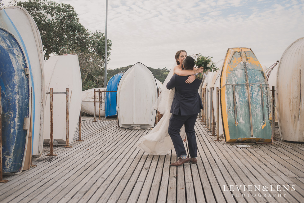 bride and groom swing twist Brigham - Herald Island {Auckland lifestyle wedding photographer}