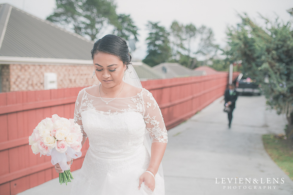 bride walking on drivewayChurch Of The Holy Sepulchre - Bastion Point {Auckland NZ lifestyle wedding-engagement photographer}