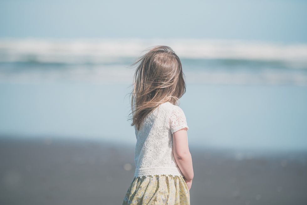 girl near the water Kariotahi beach photo shoot {Auckland lifestyle family-kids photographer}