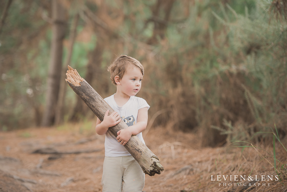 girl with wood Adventures on the bike track {Hamilton NZ lifestyle wedding photographer}