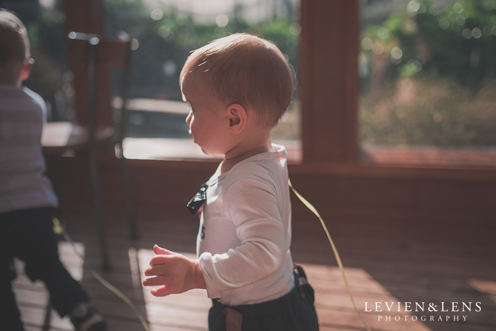 baby boy walking Butterfly Creek Minions birthday party {Auckland NZ event photographer} Nazar 1 year old