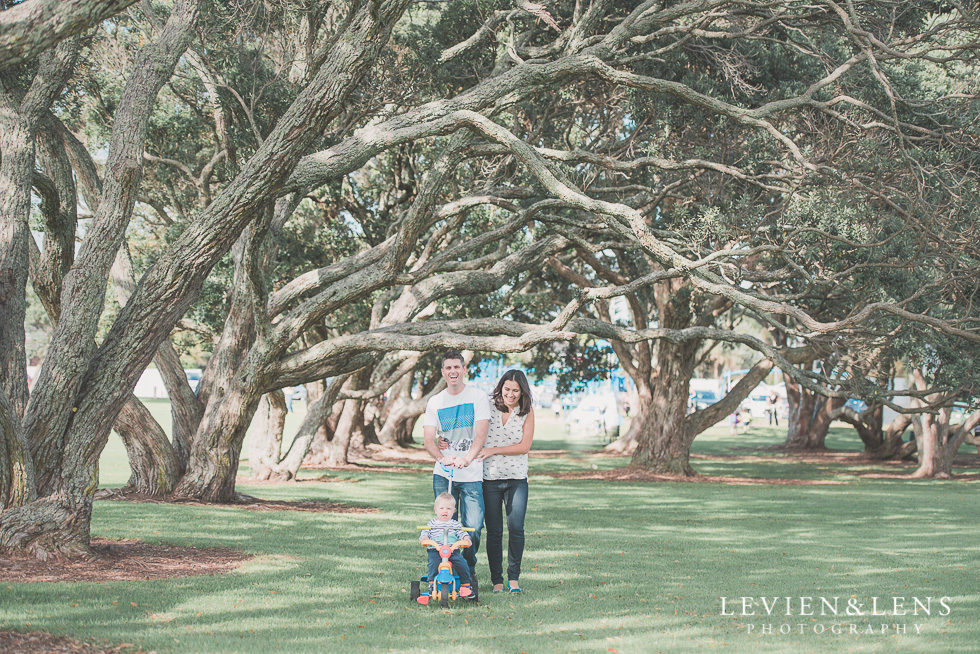 family of three walking in park Milford Beach family session {Auckland lifestyle photographer}