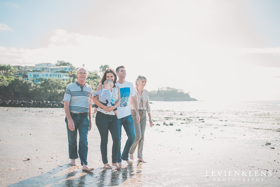 family with grandparents walking on seaside Milford Beach family session {Auckland lifestyle photographer}