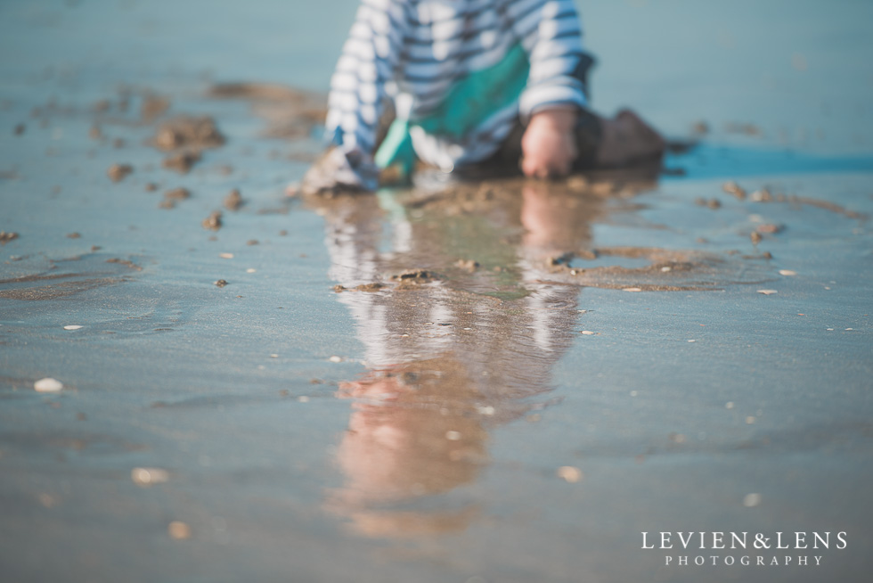 boy playing in sand Milford Beach family session {Auckland lifestyle photographer}