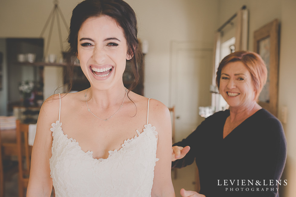 brides laughing at getting ready St Margarets Cafe - Karaka {Auckland lifestyle wedding photographer}