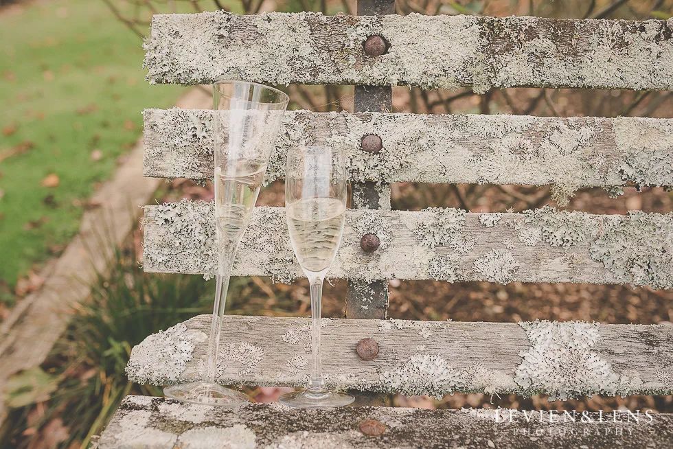 champaign glasses on the bench St Margarets Cafe - Karaka {Auckland lifestyle wedding photographer}