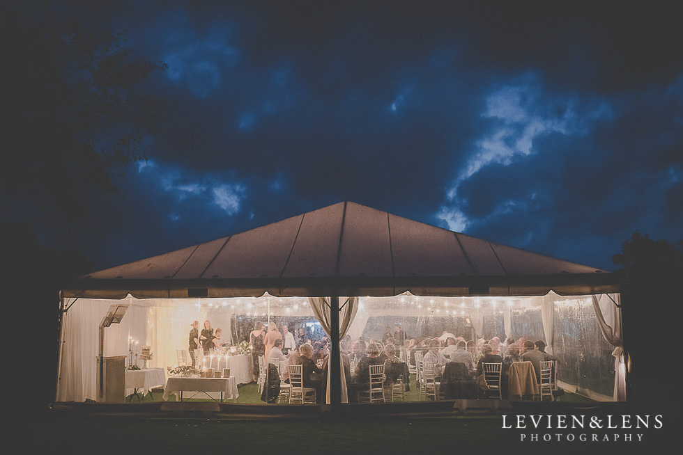 reception marquee from outside - night photography St Margarets Cafe - Karaka {Auckland lifestyle wedding photographer}