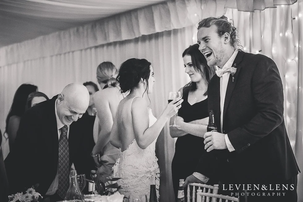 groom and brides dad laughing - reception St Margarets Cafe - Karaka {Auckland lifestyle wedding photographer}