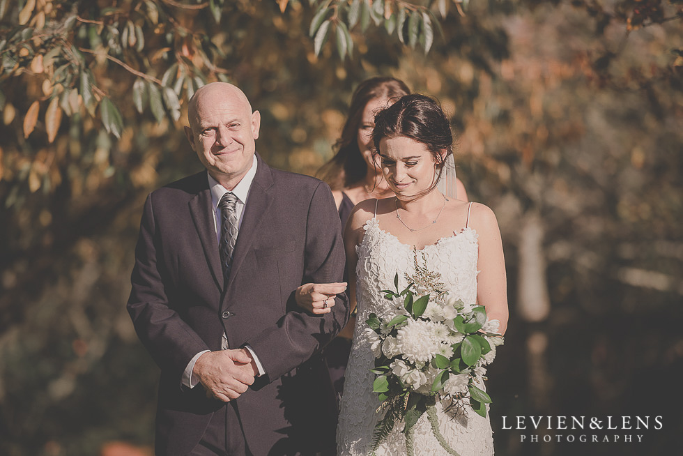 bride with dad walking down aisle St Margarets Cafe - Karaka {Auckland lifestyle wedding photographer}