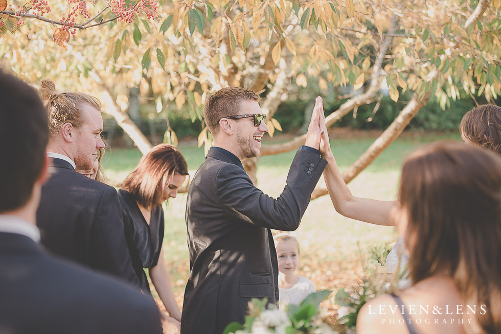 candid moments after ceremony St Margarets Cafe - Karaka {Auckland lifestyle wedding photographer}