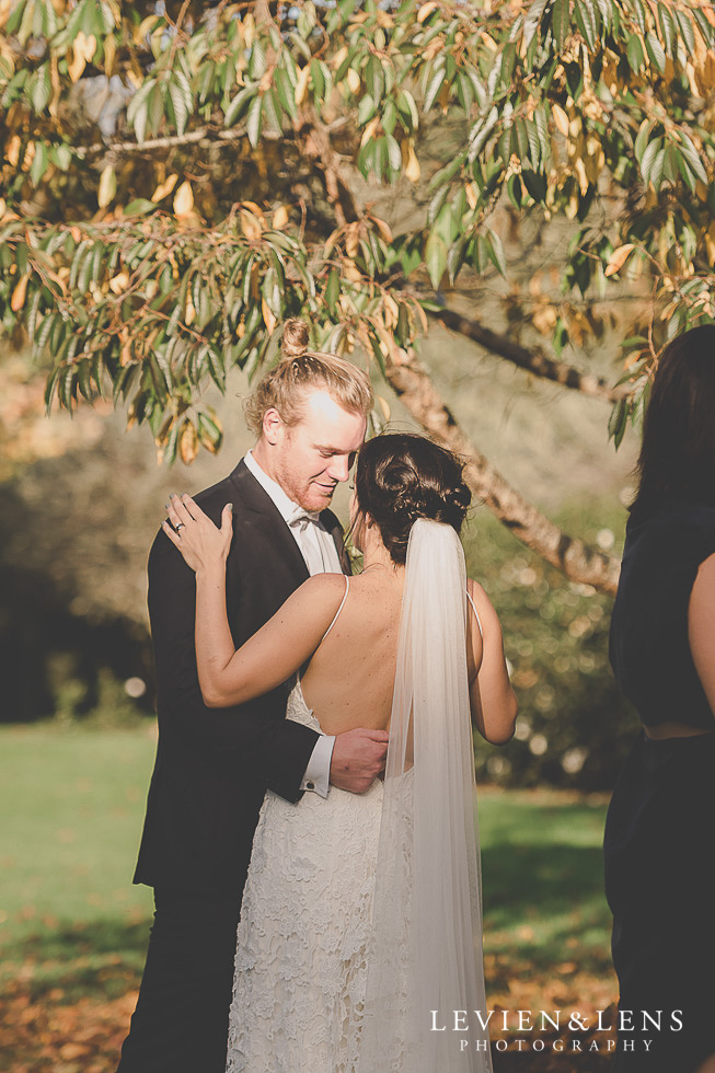 bride and groom candid moments after ceremony - St Margarets Cafe - Karaka {Auckland lifestyle wedding photographer}