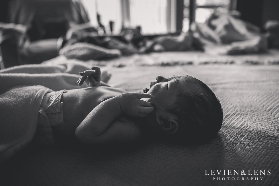 baby on bed BW in home session {Hamilton NZ lifestyle family-newborn-kids photographer}