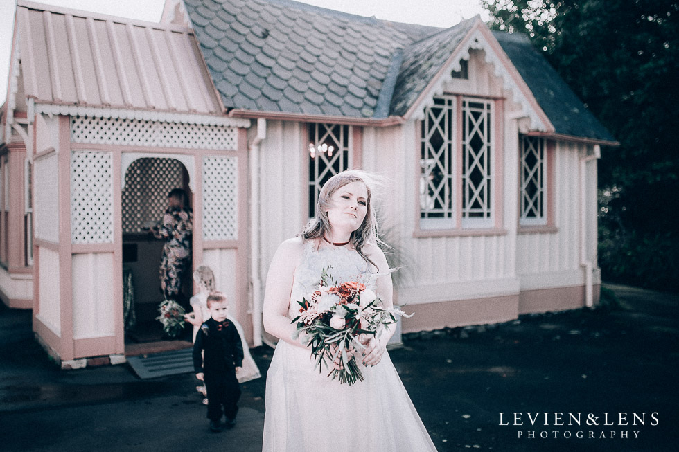 bride walking to ceremony - Highwic historic house-museum winter wedding {Auckland NZ lifestyle weddings photographer}
