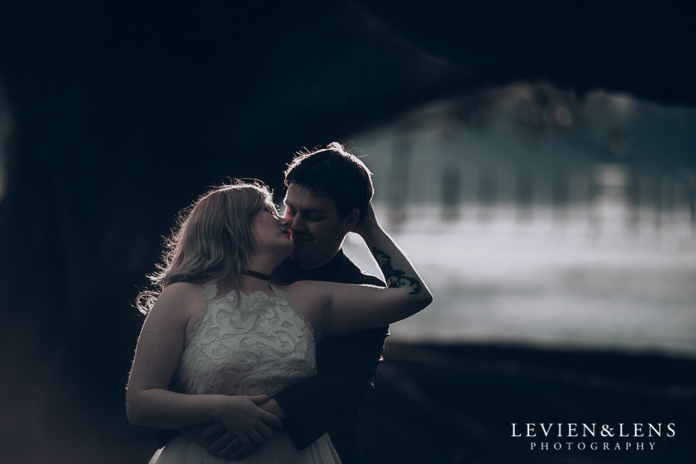 bride and groom - rim light - Cornwall park photo session - winter wedding {Auckland NZ lifestyle weddings photographers}