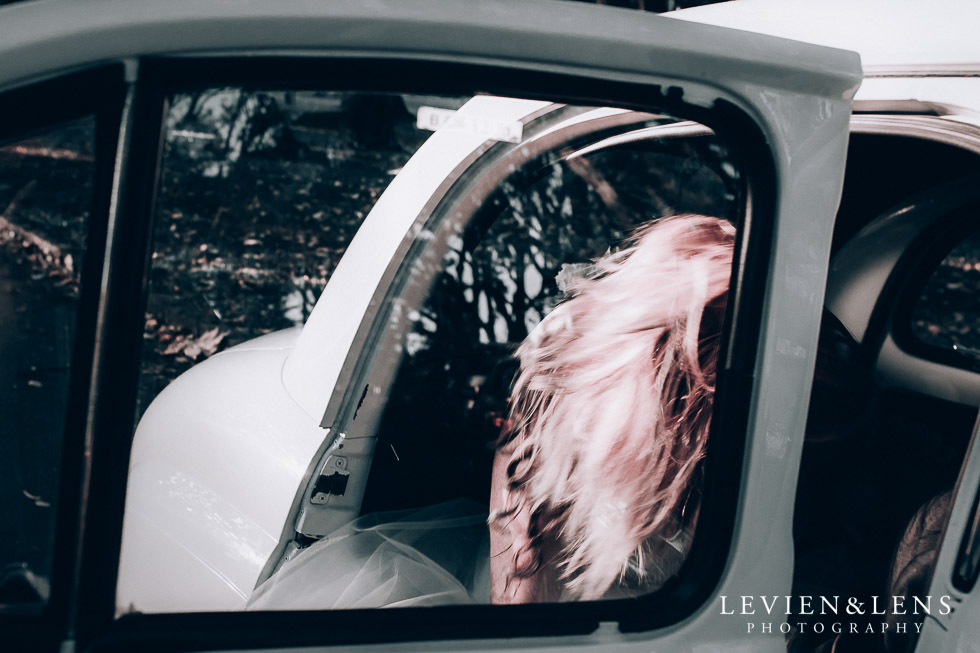 bride sitting in retro car - Cornwall park photo session - winter wedding {Auckland NZ lifestyle weddings photographers}