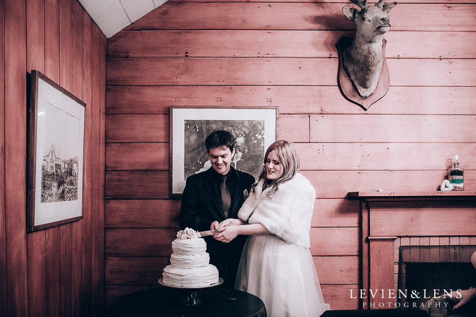 cake cutting - reception Highwic historic house-museum winter wedding {Auckland NZ lifestyle weddings photographer}