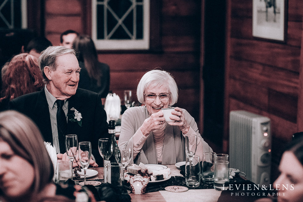 old guests laughing - reception tea - Highwic historic house-museum winter wedding {Auckland NZ lifestyle weddings photographer}