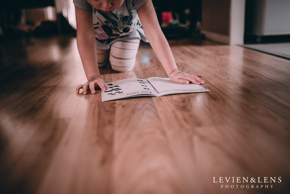 girl reading on the floor - August {Hamilton-Taupo lifestyle wedding photographer}